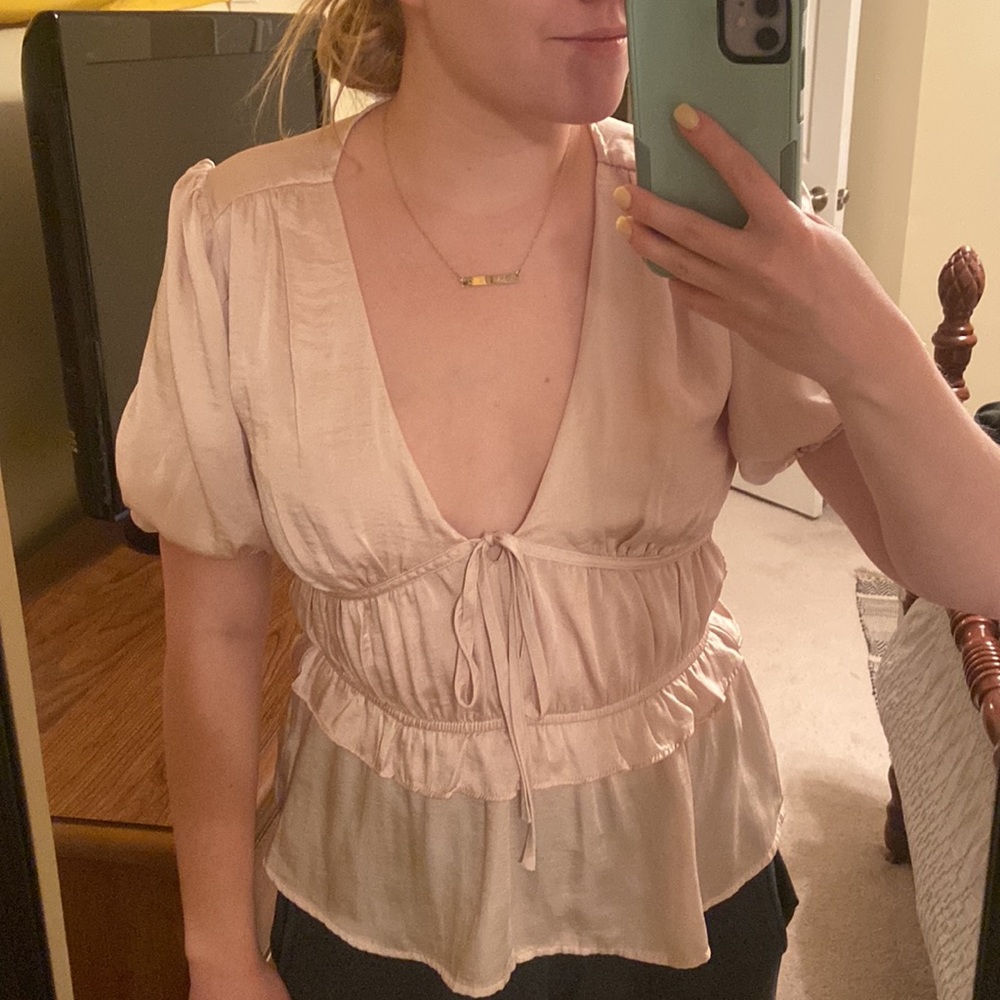 Very pretty satin blush pink top with v neck cup and ruffled detail